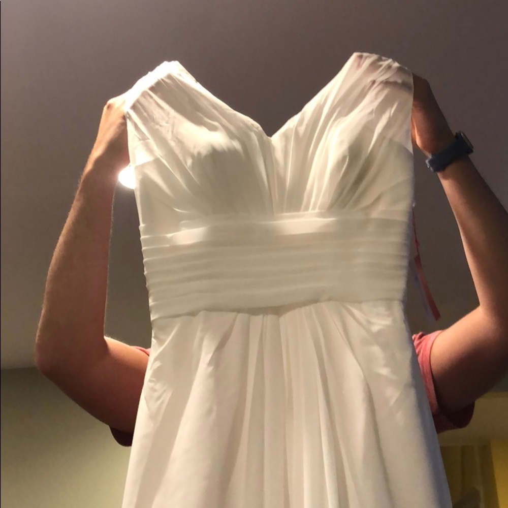White gown perfect for graduation or prom